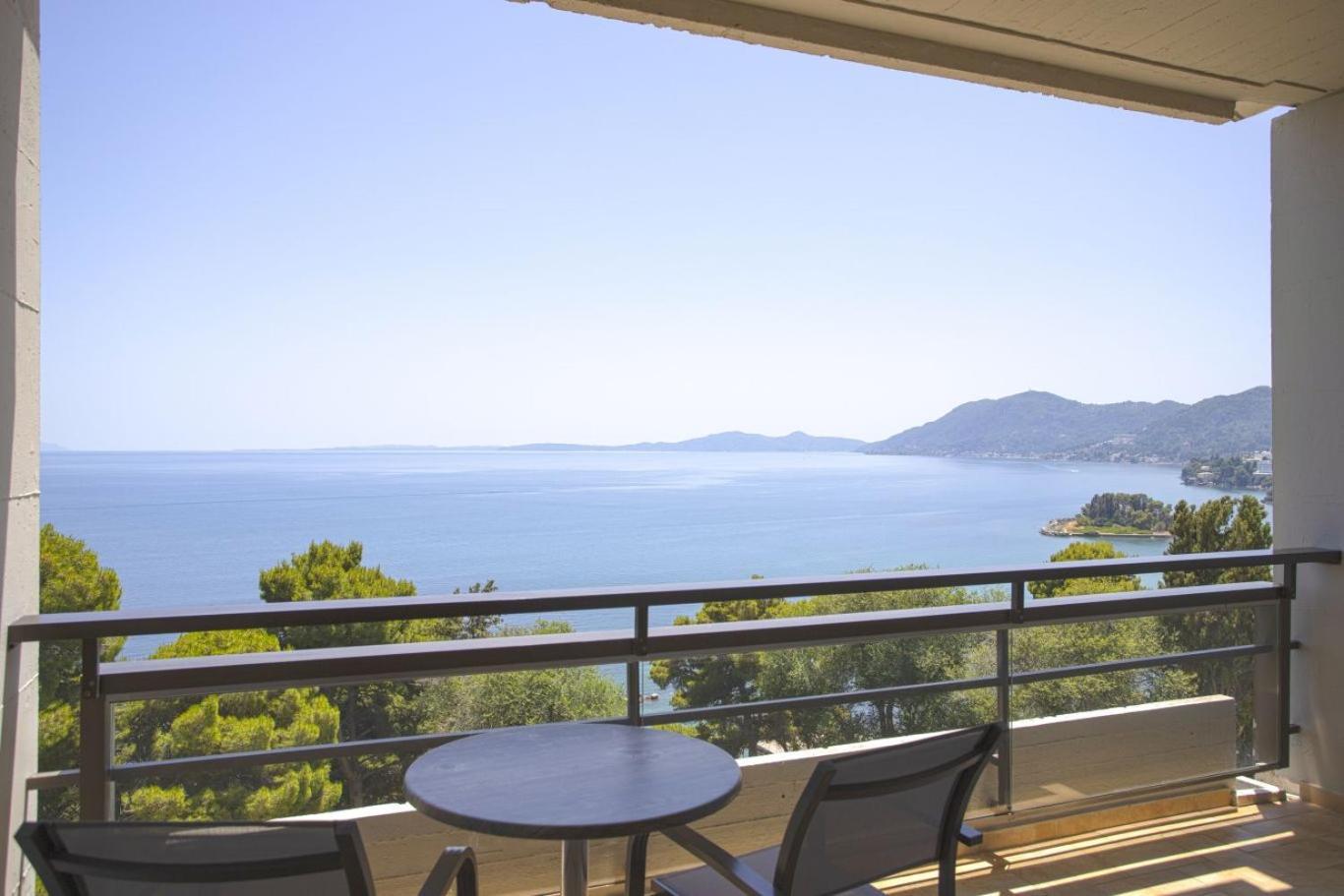 Corfu Holiday Palace Perama  Exterior photo View from the balcony of a suite at the Hotel Splendid